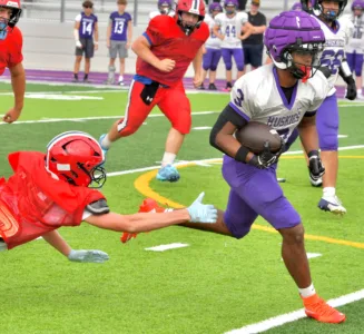 Huskies clash with Indians during football scrimmage